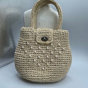 Vintage Japan woven Raffia handbag satchel twist lock.